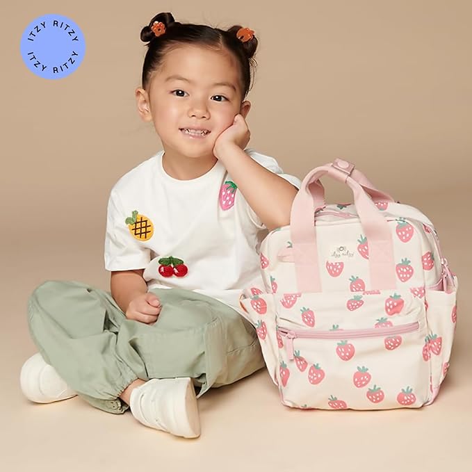 Itzy Ritzy Toddler Backpack - Daycare Bag - Features Adjustable Shoulder Straps, 2 Side Pockets & Spacious Interior with Wipeable Fabric Lining & Name Label, Strawberry Backpack
