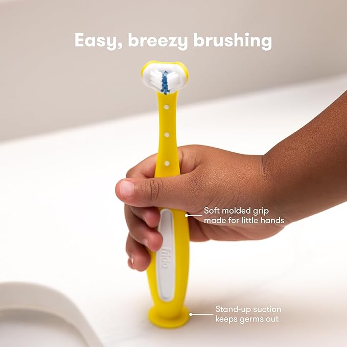 Frida Baby Triple-Angle Toothhugger Training Toddler Toothbrush | Toddler Toothbrush 2 Years and Up, Cleans All Sides at Once | 2 Pack (Yellow + Blue)