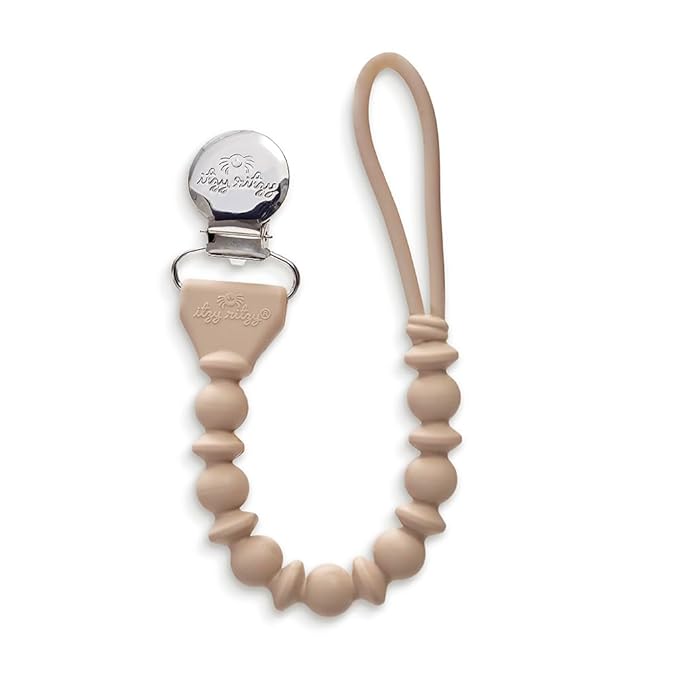 Itzy Ritzy Silicone Pacifier Clip; 100% Food Grade Silicone Pacifier Strap with Clip Keeps Pacifiers, Teethers & Small Toys in Place; Features One-Piece Design & Cord (Toast)