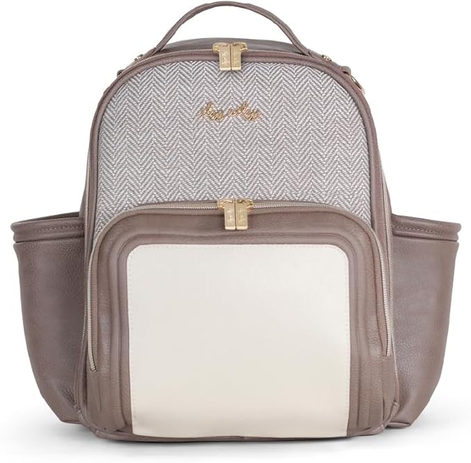 Itzy Ritzy Mini Diaper Bag Backpack – Chic, Compact Mini Plus Backpack with Changing Pad, 10 Pockets (6 Internal, 4 External), Grab-Top Handle & Rubber Feet (Vanilla Latte)