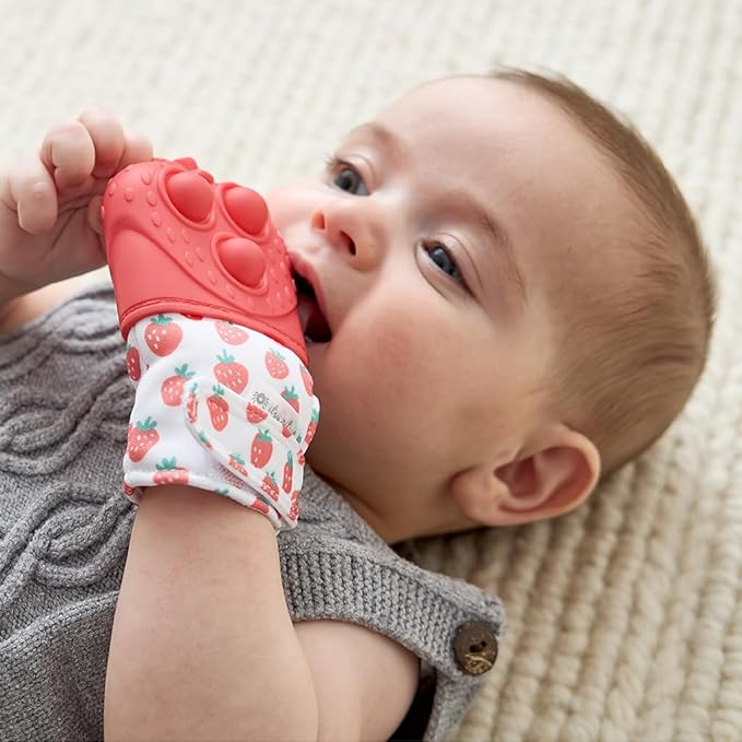 Itzy Ritzy Silicone Teething Mitt - Soothing Infant Teething Mitten with Adjustable Strap, Crinkle Sound & Textured Silicone to Soothe Sore & Swollen Gums - for Ages 3 Months & Up (Strawberry)