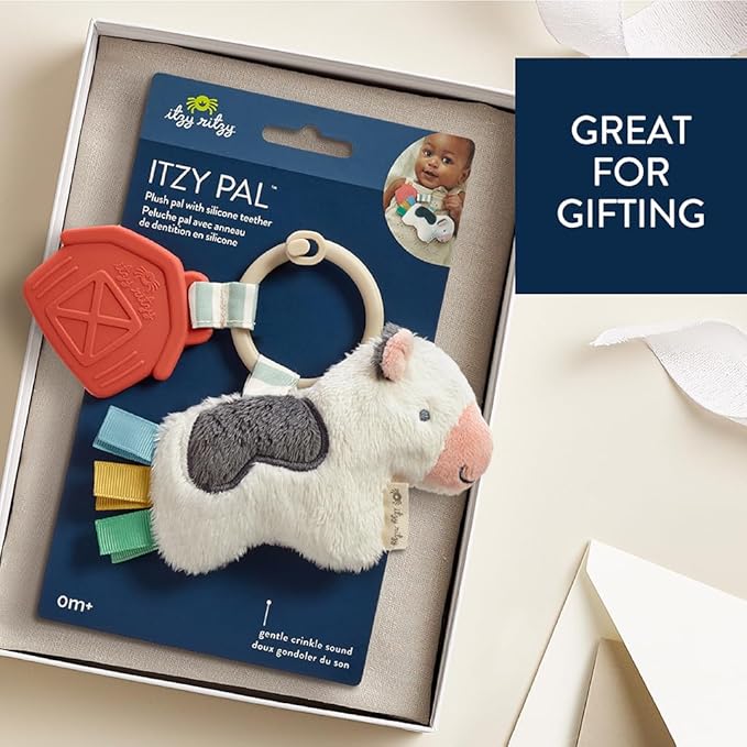 Itzy Ritzy Infant Toy & Teether - Itzy Pal Baby Teething Toy Includes Lovey, Crinkle Sound, Textured Ribbons & Silicone Teether for Newborn (Cow)