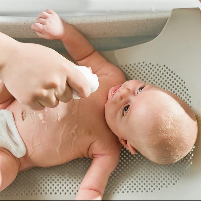 The First Years First Suds Newborn to Toddler Tub – 3 Stage Baby Bathtub with Soft, Non-Slip Infant Sling – Birth to 25 Pounds