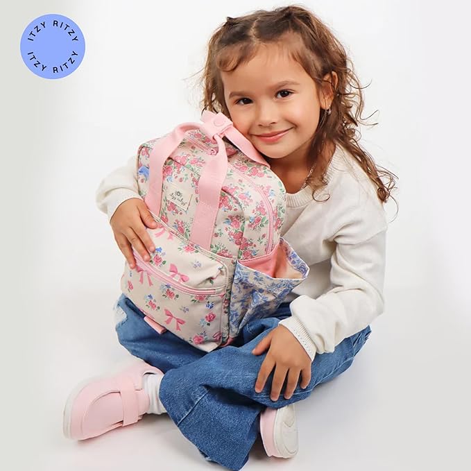 Itzy Ritzy Toddler Backpack - Daycare Bag - Features Adjustable Shoulder Straps, 2 Side Pockets & Spacious Interior with Wipeable Fabric Lining & Name Label, Ribbons & Roses Backpack