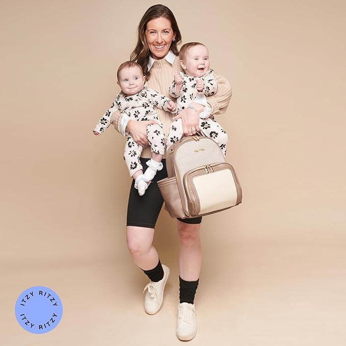 Itzy Ritzy Mini Diaper Bag Backpack – Chic, Compact Mini Plus Backpack with Changing Pad, 10 Pockets (6 Internal, 4 External), Grab-Top Handle & Rubber Feet (Vanilla Latte)
