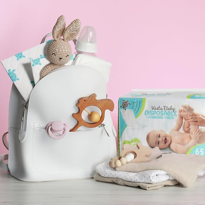Vesta Baby 65 Disposable Changing Pads - Soft Absorbent Leak Proof Pee Mats - White Portable Diaper Change Underpads for Bed & Table Protection - 15" x 20" Waterproof Liners