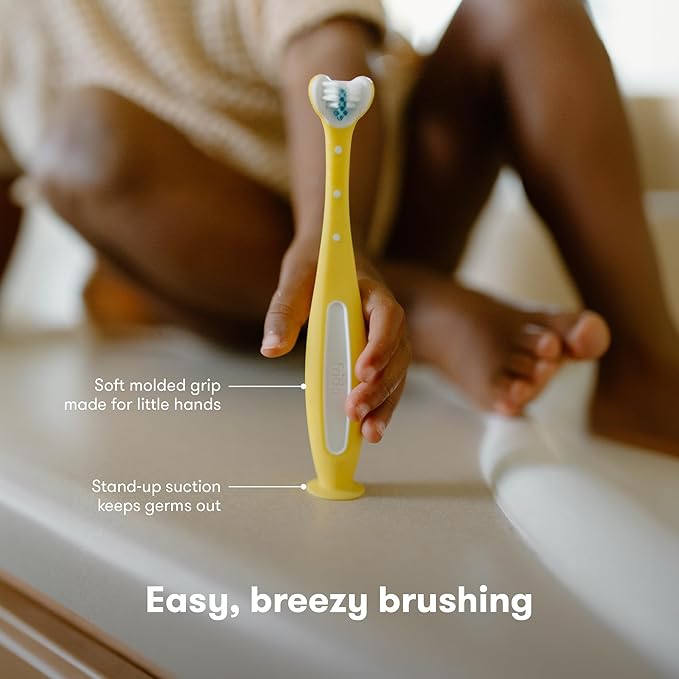 Frida Baby Triple-Angle Toothhugger Training Toddler Toothbrush | Toddler Toothbrush 2 Years and Up, Cleans All Sides at Once | Yellow