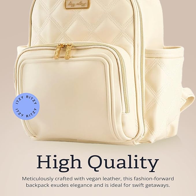 Itzy Ritzy Mini Diaper Bag Backpack – Chic, Compact Mini Plus Backpack with Changing Pad, 10 Pockets (6 Internal, 4 External), Grab-Top Handle & Rubber Feet (Milk & Honey)