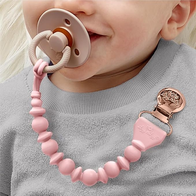 Itzy Ritzy Silicone Pacifier Clip; 100% Food Grade Silicone Pacifier Strap with Clip Keeps Pacifiers, Teethers & Small Toys in Place Features One-Piece Design & Cord (Pink)