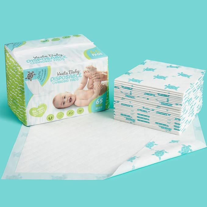 Vesta Baby 65 Disposable Changing Pads - Soft Absorbent Leak Proof Pee Mats - White Portable Diaper Change Underpads for Bed & Table Protection - 15" x 20" Waterproof Liners