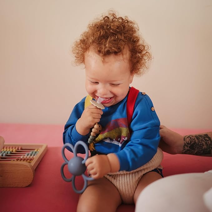 mushie Silicone Baby Daisy Rattle Teether Toy (Faded Denim)