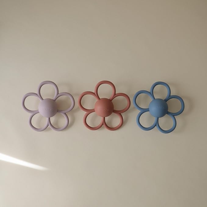 mushie Silicone Baby Daisy Rattle Teether Toy (Soft Lilac)