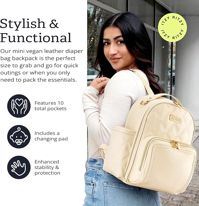 Itzy Ritzy Mini Diaper Bag Backpack – Chic, Compact Mini Plus Backpack with Changing Pad, 10 Pockets (6 Internal, 4 External), Grab-Top Handle & Rubber Feet (Milk & Honey)