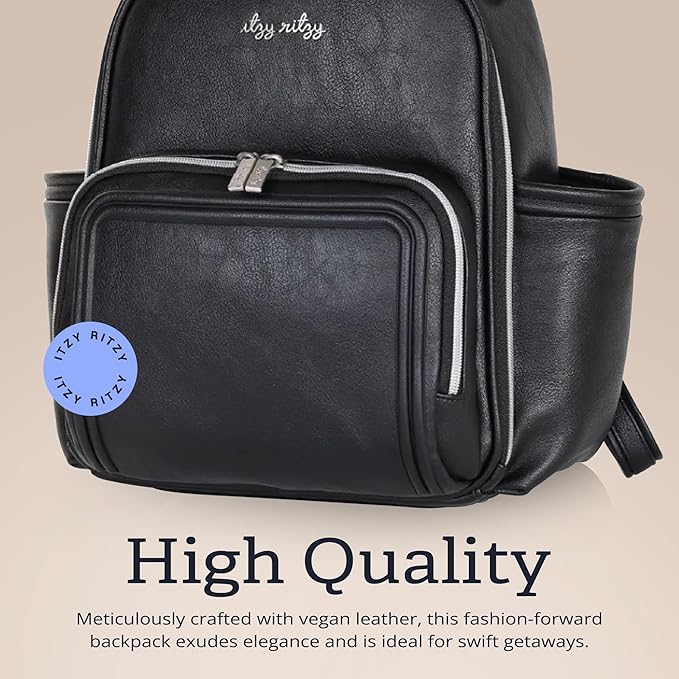 Itzy Ritzy Mini Diaper Bag Backpack – Chic, Compact Mini Plus Backpack with Changing Pad, 10 Pockets (6 Internal, 4 External), Grab-Top Handle & Rubber Feet (Black w/Silver Hardware)
