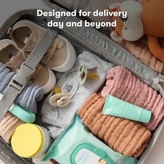 Frida Mom 30pc Pre-Packed Hosptial & Baby Essentials Travel Bag, Includes C-Section Delivery & Recovery Must Haves, & Newborn Grooming Kit, Easy to Organize, Removable Toiletry Bags & Suitcase Strap