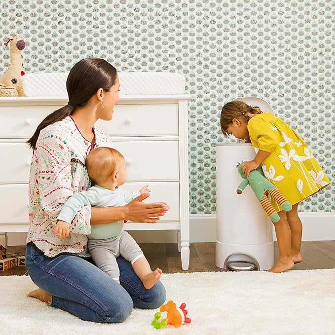 Munchkin® STEP™ Diaper Pail Powered by Arm & Hammer, #1 in Odor Control, Award-Winning, Includes 7 Snap, Seal & Toss™ Bags, 1 Starter Refill Ring, and 1 PUCK™ Baking Soda Cartridge