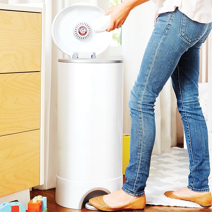 Munchkin® Step™ Diaper Pail Powered by Arm & Hammer, #1 in Odor Control, Award-Winning, Includes 1 Snap, Seal & Toss™ Bag, 1 Starter Refill Ring, and 4 Puck™ Baking Soda Cartridges